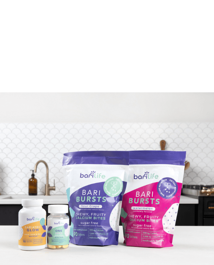 Bari Life Bari Bursts calcium bites in sour grape and watermelon flavors, sugar-free, on a kitchen counter.